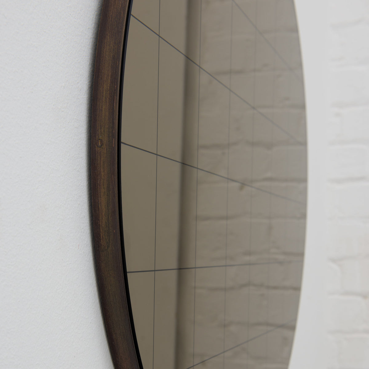 In Stock Orbis Bronze Tinted Round Mirror with Sandblasted Grid and a Bronze Patina Frame