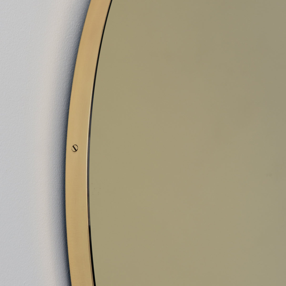 In Stock Orbis Round Gold Tinted Contemporary Mirror with a Brass Frame