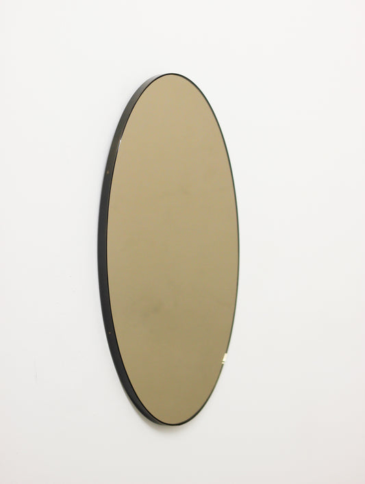 Ovalis™ Oval shaped Bronze Contemporary Mirror with Brass Patina Frame