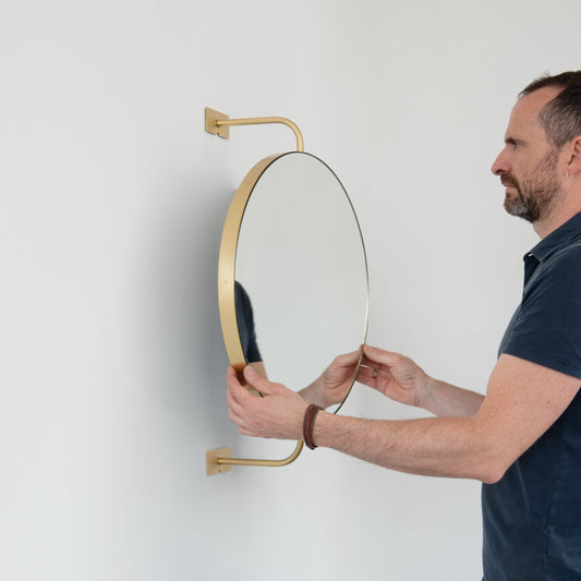 NEW Vorso™ Wall-Attached Suspended Rotating Round Mirror with a Brushed Brass Frame