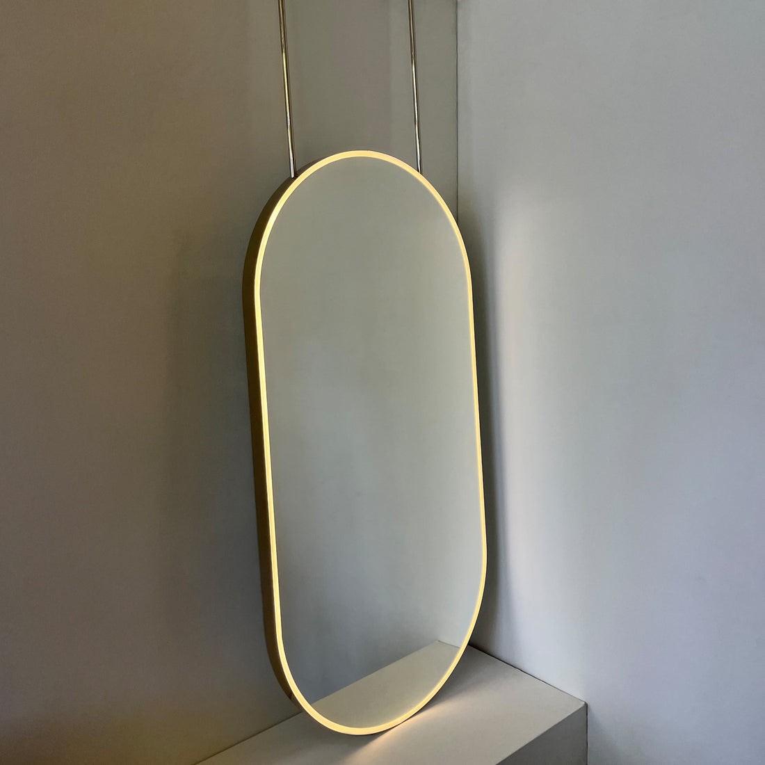 Capsula Pill-Shaped Illuminated Ceiling-Suspended Mirror with Nickel-Plated Frame