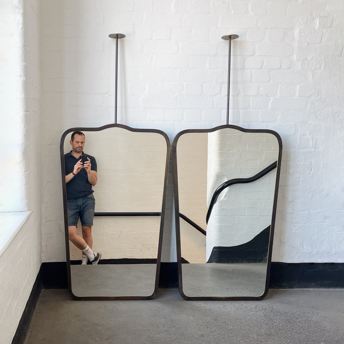 Set of two Mid Century Inspired Ceiling Suspended Mirrors with Bronze Patina Frame