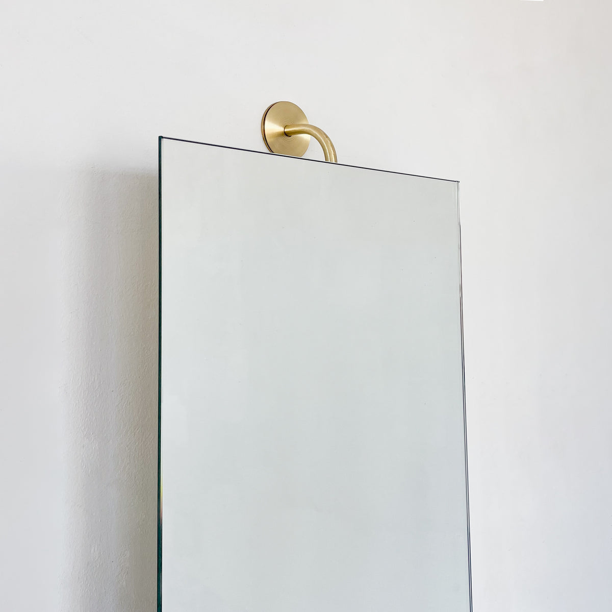 Vorso™ Wall Attached Rotating Rectangular Mirror with Brushed Brass Backing