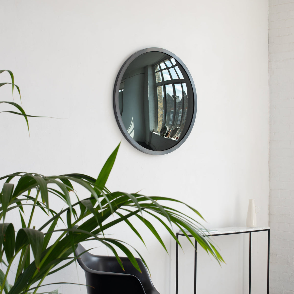 In Stock Orbis™ Round Black Convex Handcrafted Mirror with Blackened Metal Frame