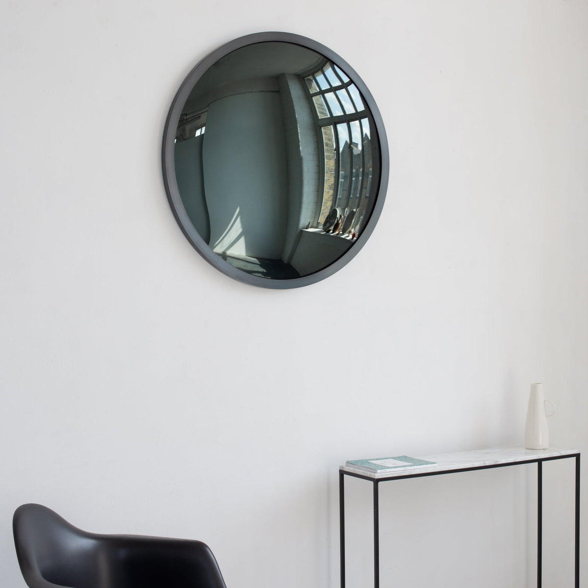 In Stock Orbis™ Round Black Convex Handcrafted Mirror with Blackened Metal Frame