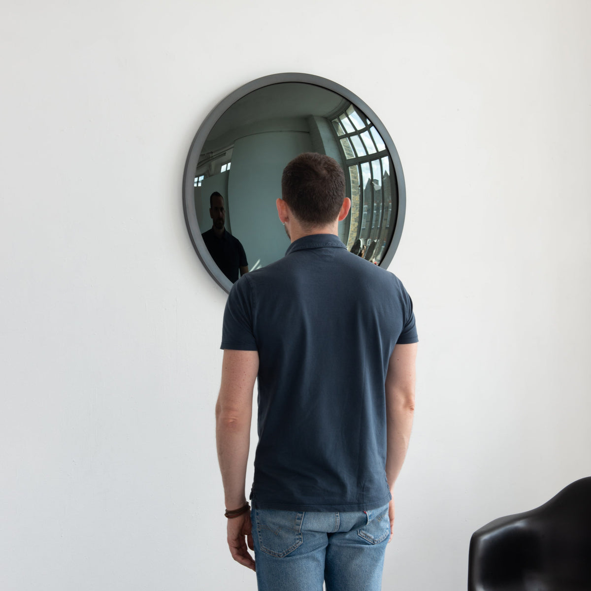 In Stock Orbis™ Round Black Convex Handcrafted Mirror with Blackened Metal Frame