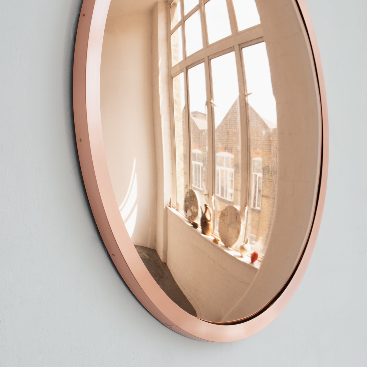 In Stock Orbis™ Round Rose Gold Convex Handcrafted Mirror with Brushed Copper Frame