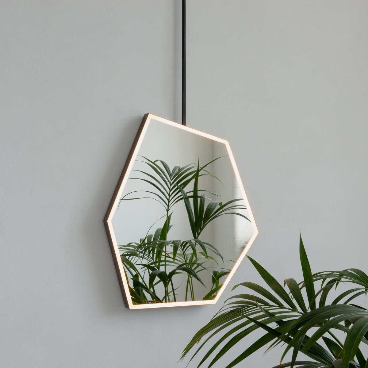 Ceiling Suspended Front Illuminated Irregular Hexagon Mirror with Minimalist Bronze Patina Frame and ON / OFF Sensor Switch