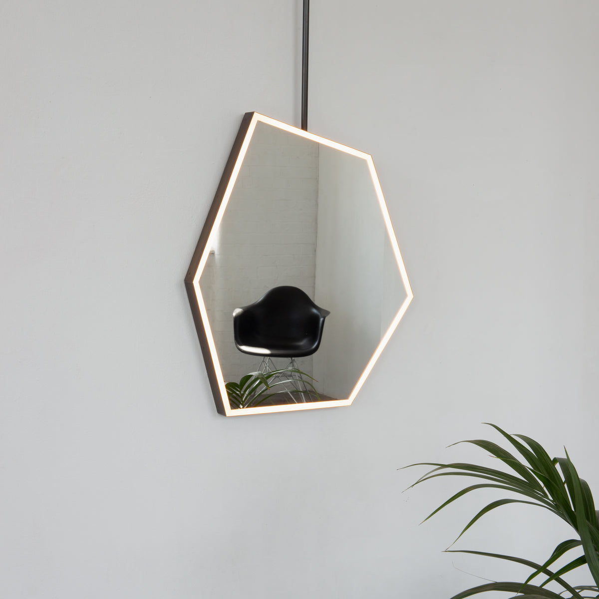 Ceiling Suspended Front Illuminated Irregular Hexagon Mirror with Minimalist Bronze Patina Frame and ON / OFF Sensor Switch