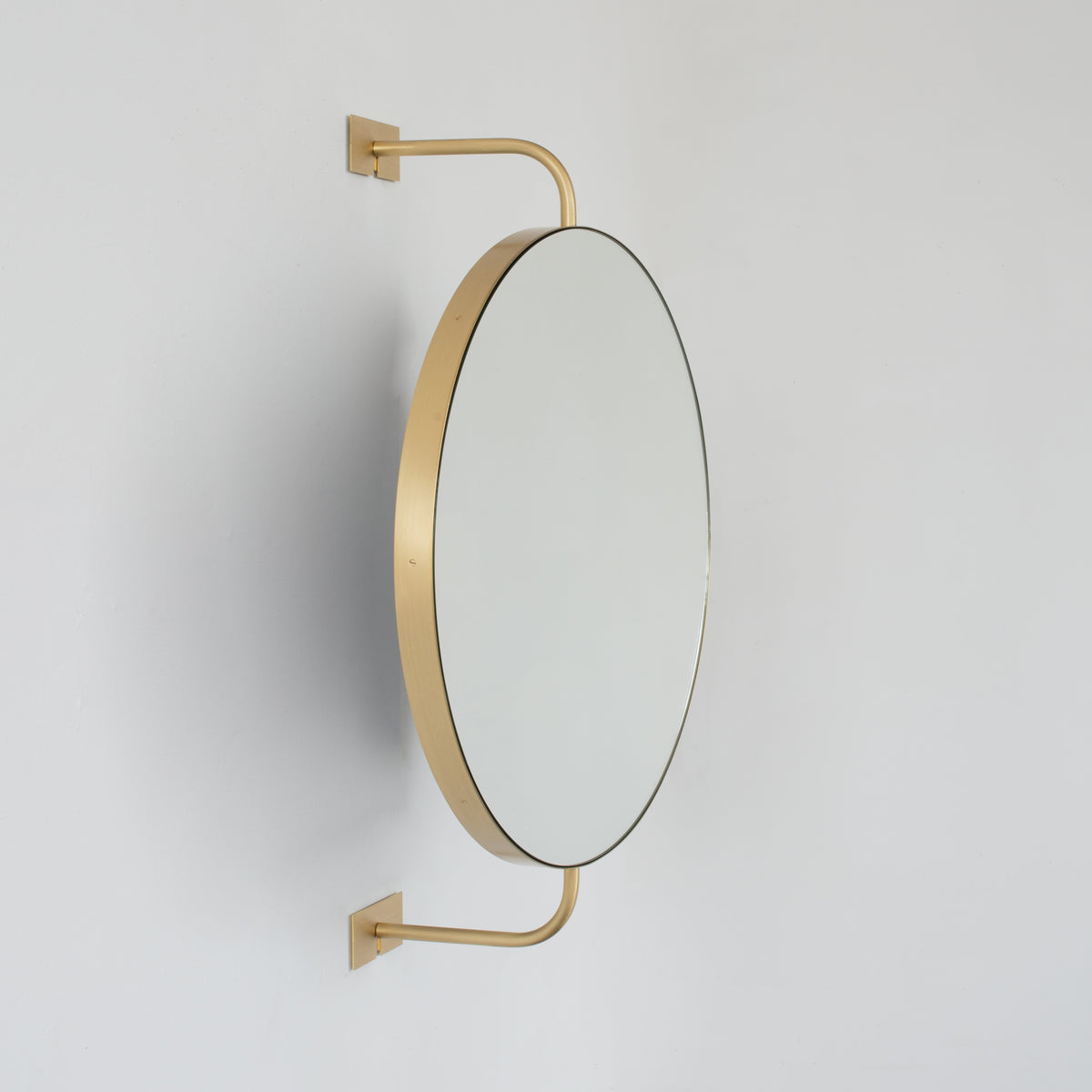Wall Attached Rotating Round Modern Mirror with Brass Frame