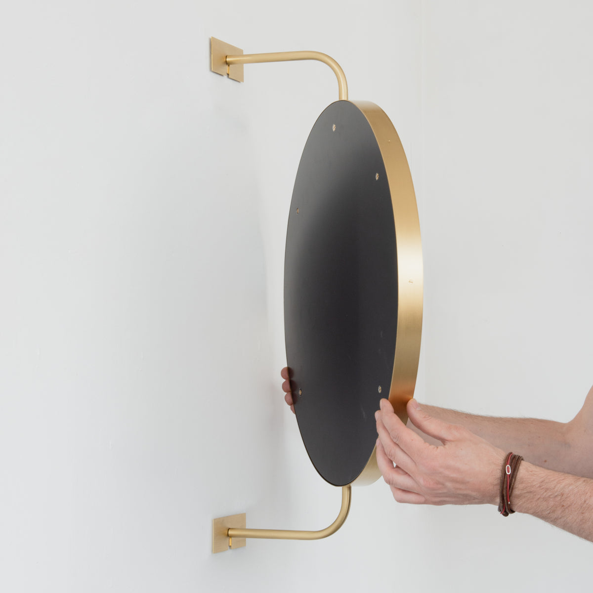 Vorso™ Wall Attached Rotating Round Modern Mirror with Brass Frame