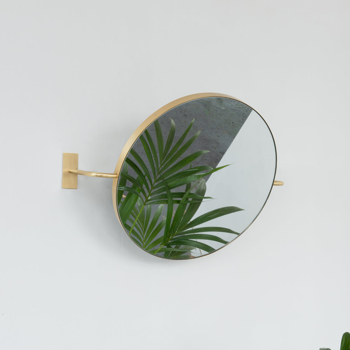 Vorso™ Wall Attached Rotating Round Modern Mirror with Brass Frame