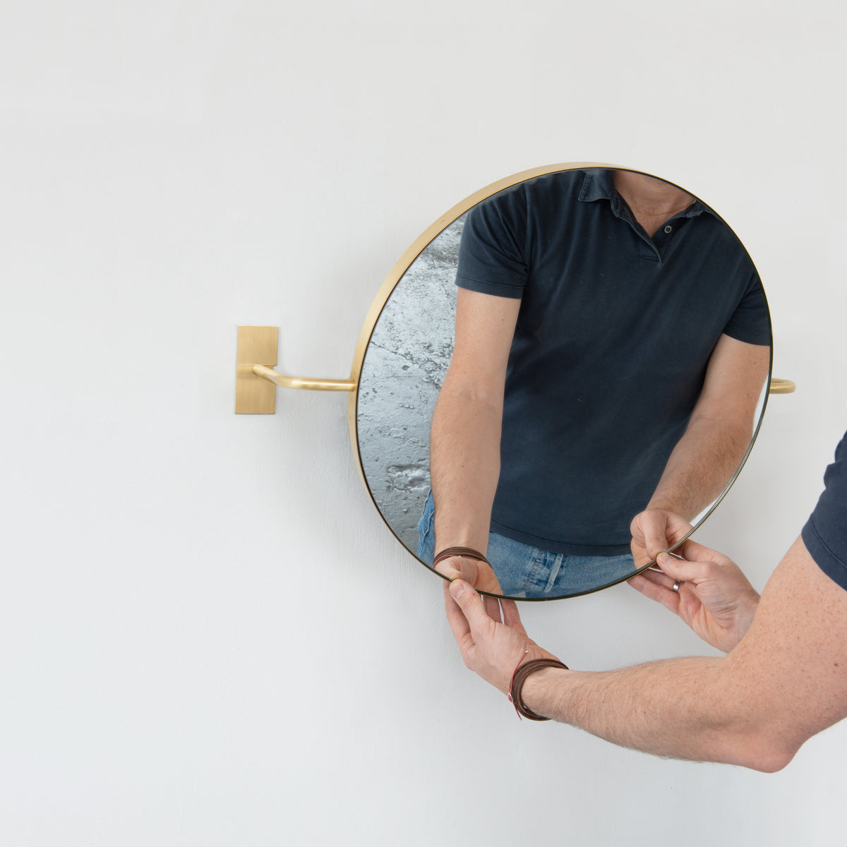 Wall Attached Rotating Round Modern Mirror with Brass Frame