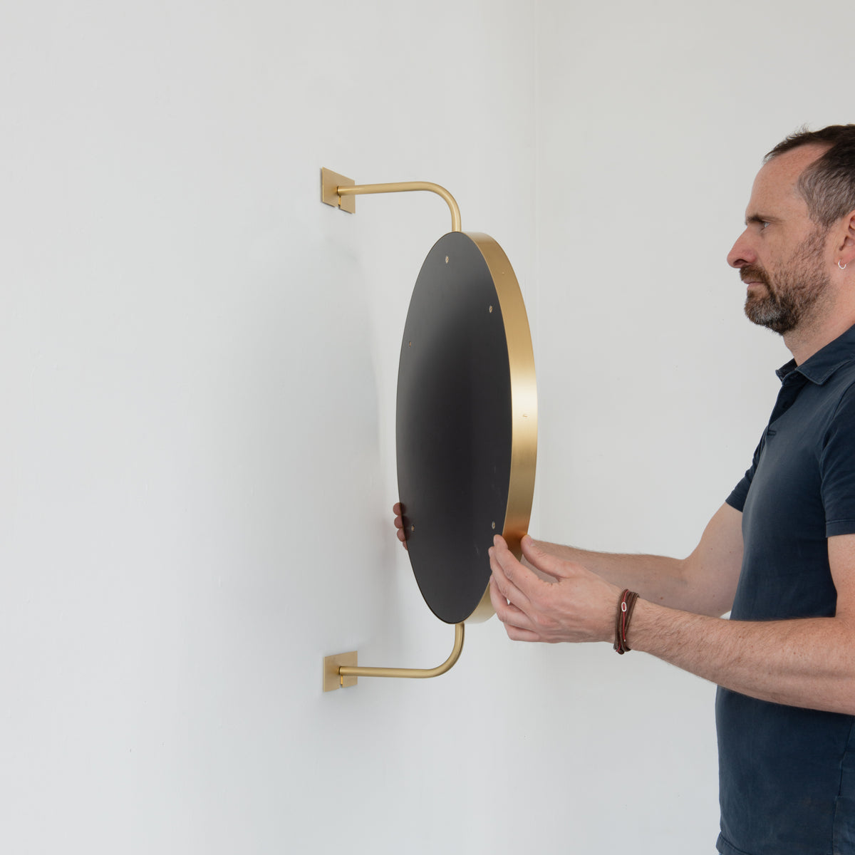 Vorso™ Wall Attached Rotating Round Modern Mirror with Brass Frame