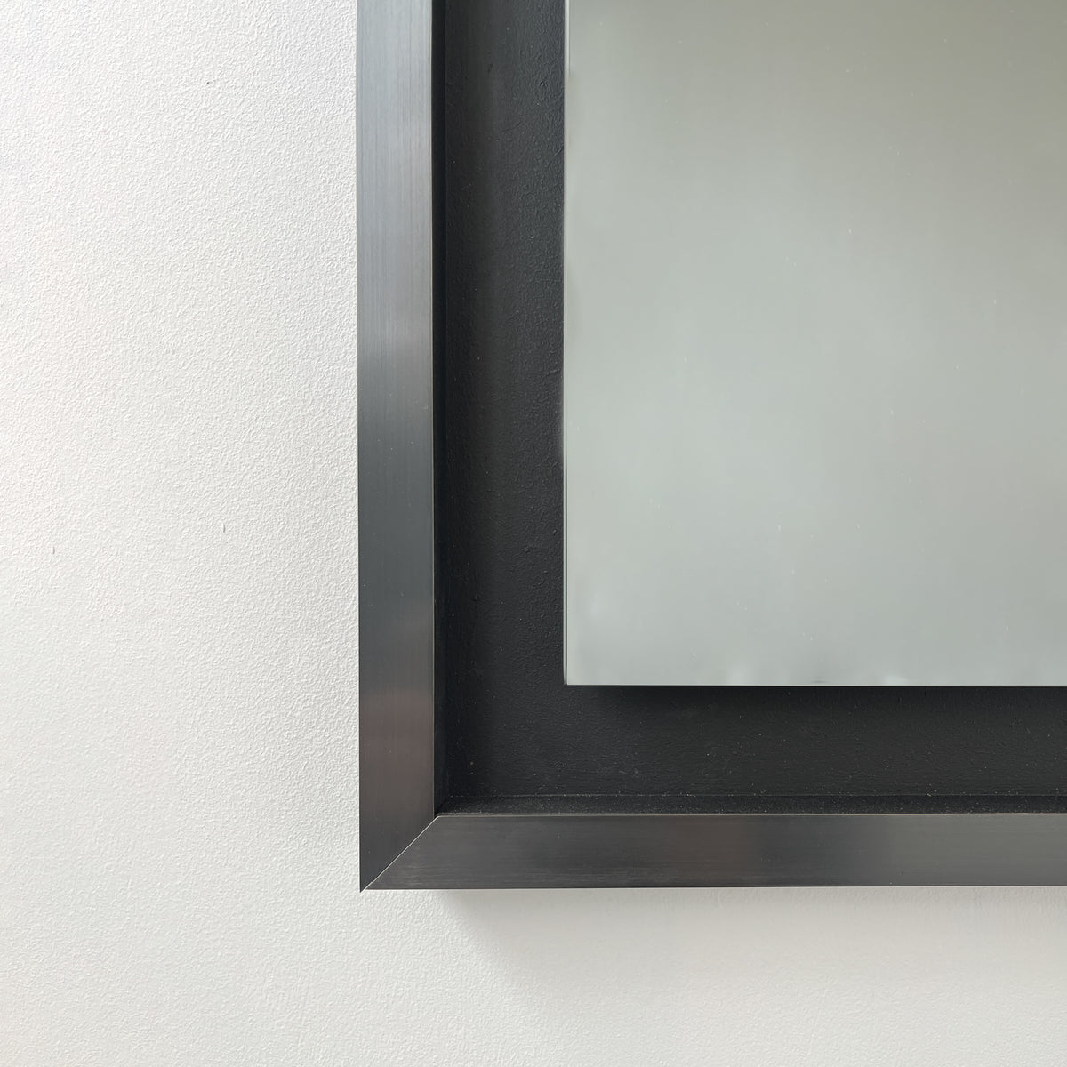 Alguacil & Perkoff illuminated arch shaped black mirror with a contemporary blackened metal frame