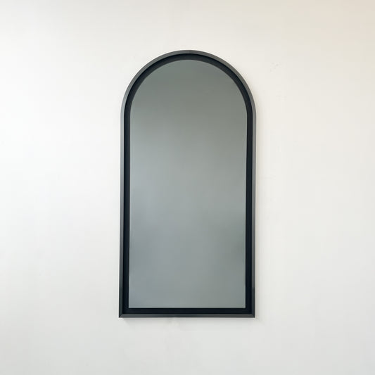 Alguacil & Perkoff illuminated arch shaped black mirror with a contemporary blackened metal frame