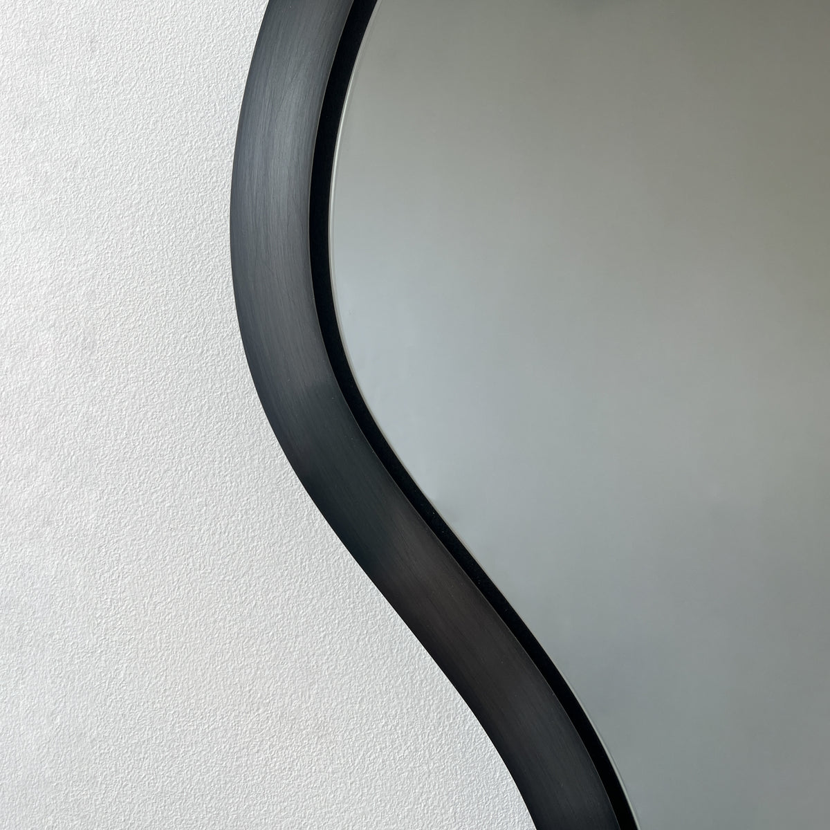 Bapa™ Freeform Organic Black Tinted Mirror with a Blackened Metal Frame