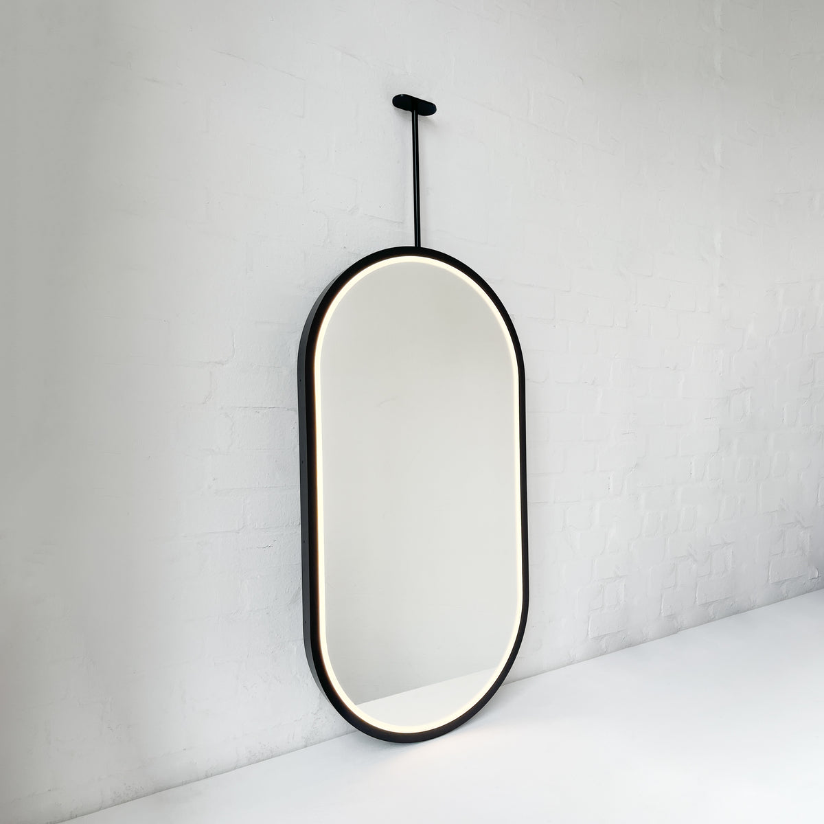 Capsula™ Ceiling-Suspended Illuminated Mirror with Contemporary Black Full Frame