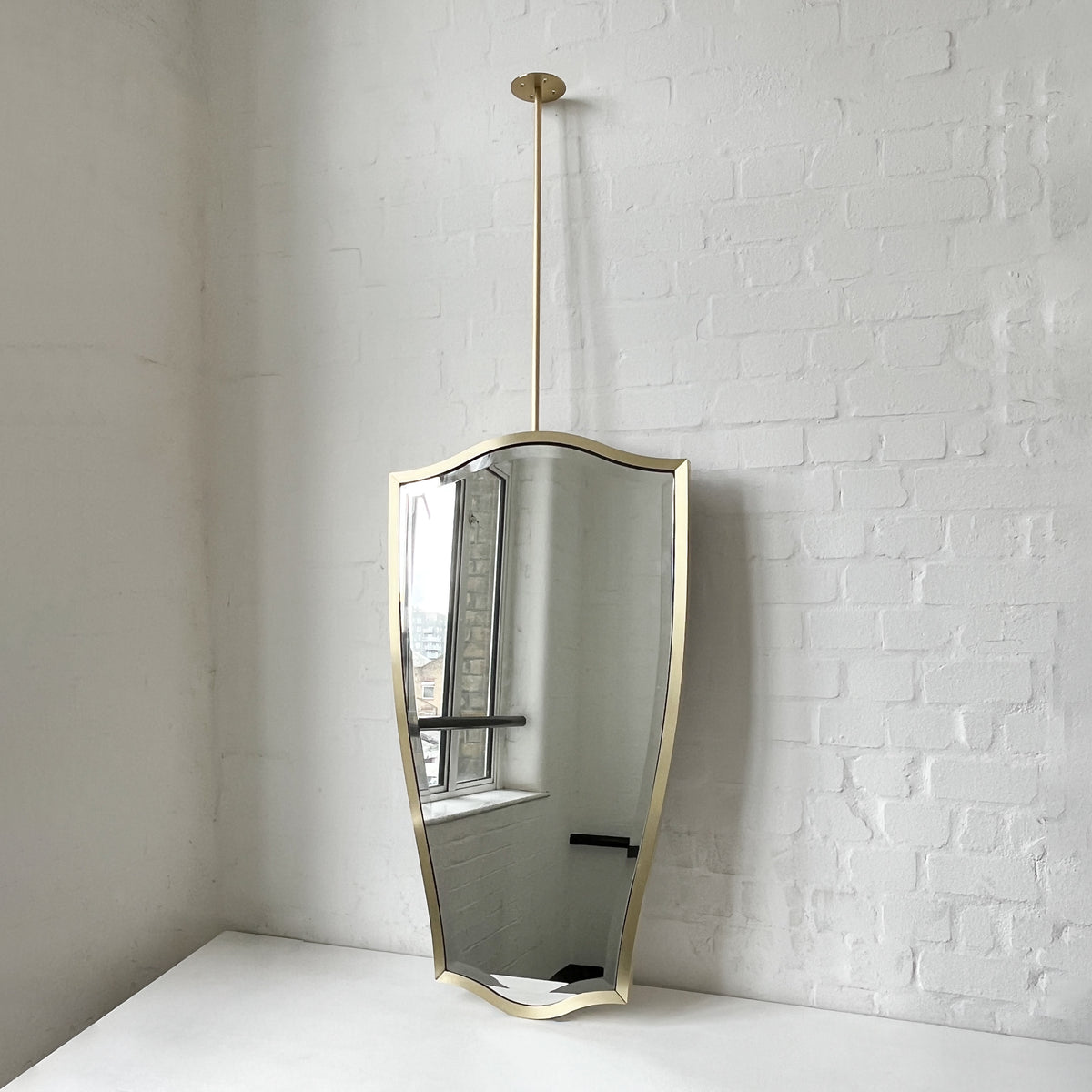 Ceiling-Suspended Vintage N.7 Freeform Mirror with a Bevel and a Brass Full Frame