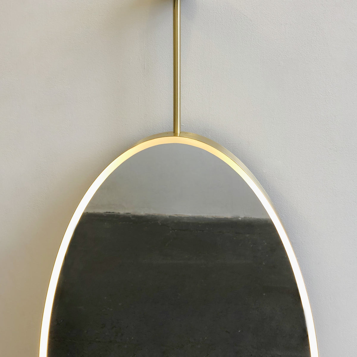 Ovalis™ Illuminated Ceiling Hanging Contemporary Oval Mirror with a Brass Frame, Customisable