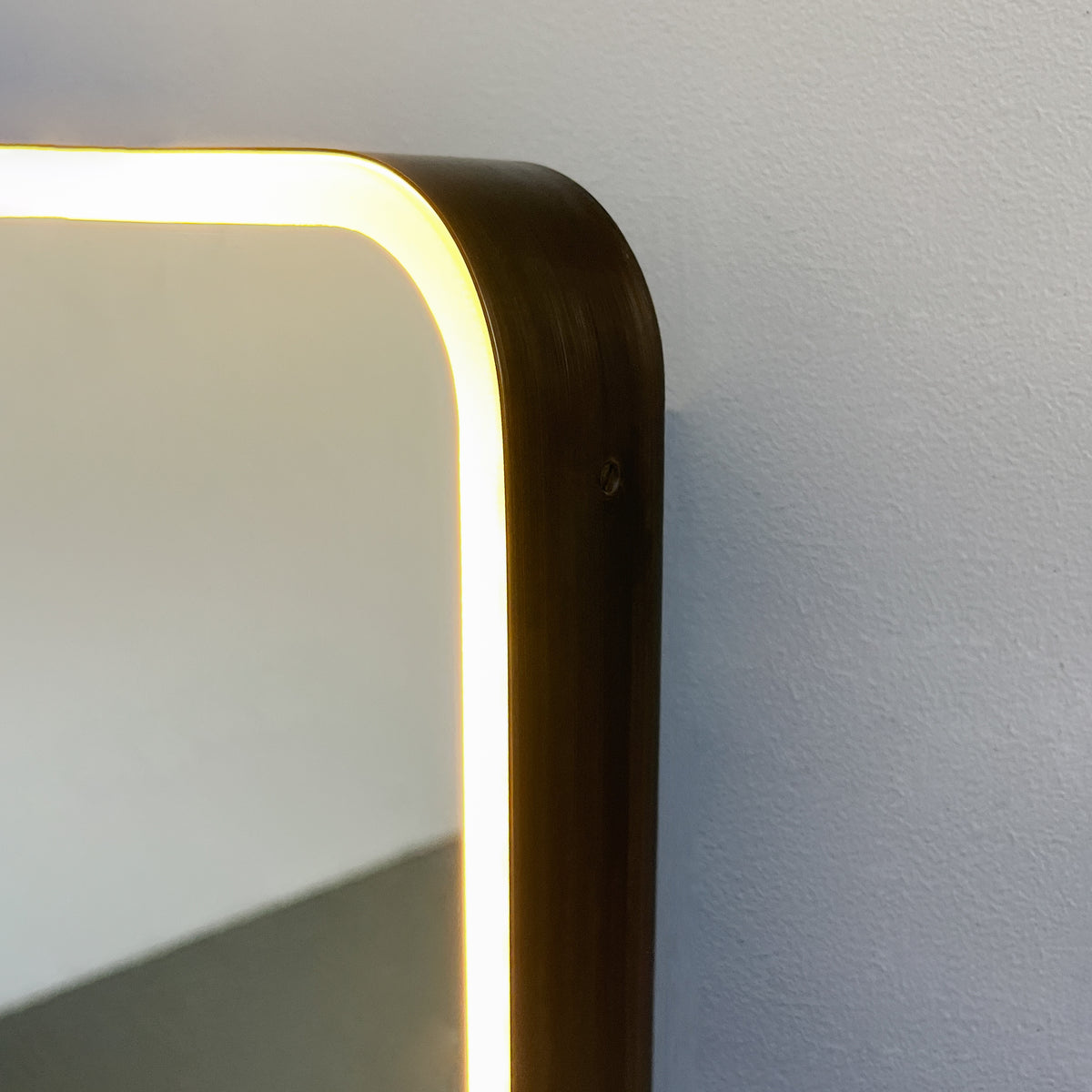 In Stock Ceiling-Suspended Quadris™ Rectangular Mirror with Bronze Patina Full Frame and Front Illumination