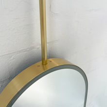 Capsula™ Ceiling Suspended Contemporary Mirror with a Brass Frame and Front Illumination
