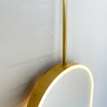 Capsula™ Ceiling Suspended Contemporary Mirror with a Brass Frame and Front Illumination