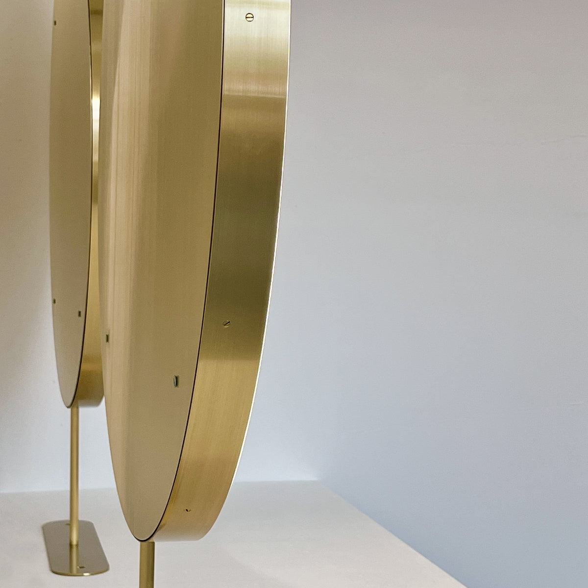 Set of Two Orbis™ Modern Countertop Round Illuminated Bathroom Mirrors with Brass Frame