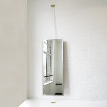 Countertop to Ceiling Rectangular Mirror with a Bevel and a Brass Frame