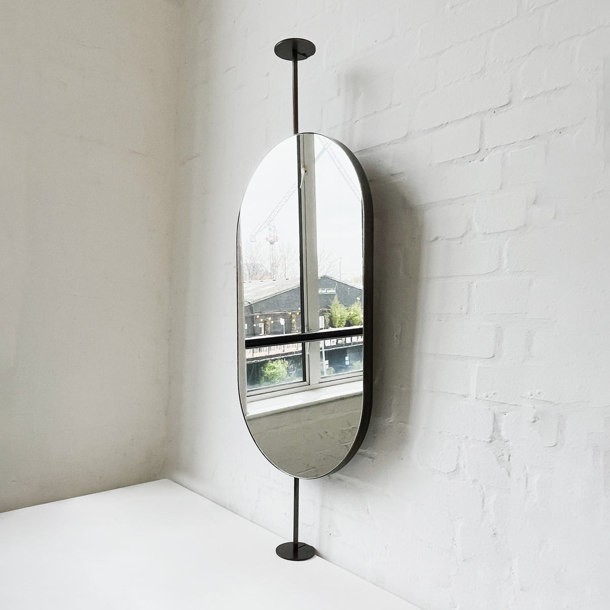 Countertop-to-Ceiling Capsula™ Mirror with Bronze Patina Brass Frame