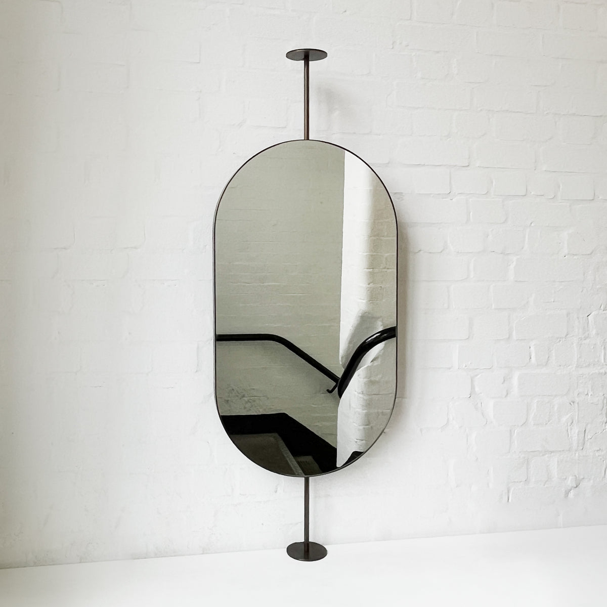 Countertop-to-Ceiling Capsula™ Mirror with Bronze Patina Brass Frame