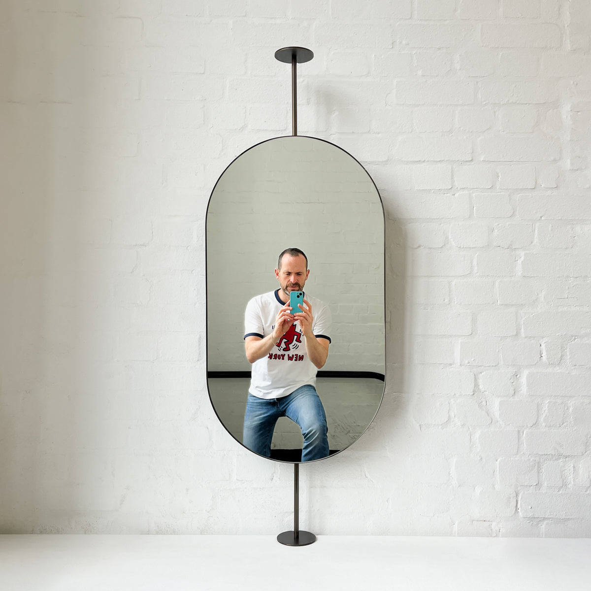 Countertop-to-Ceiling Capsula™ Mirror with Bronze Patina Brass Frame