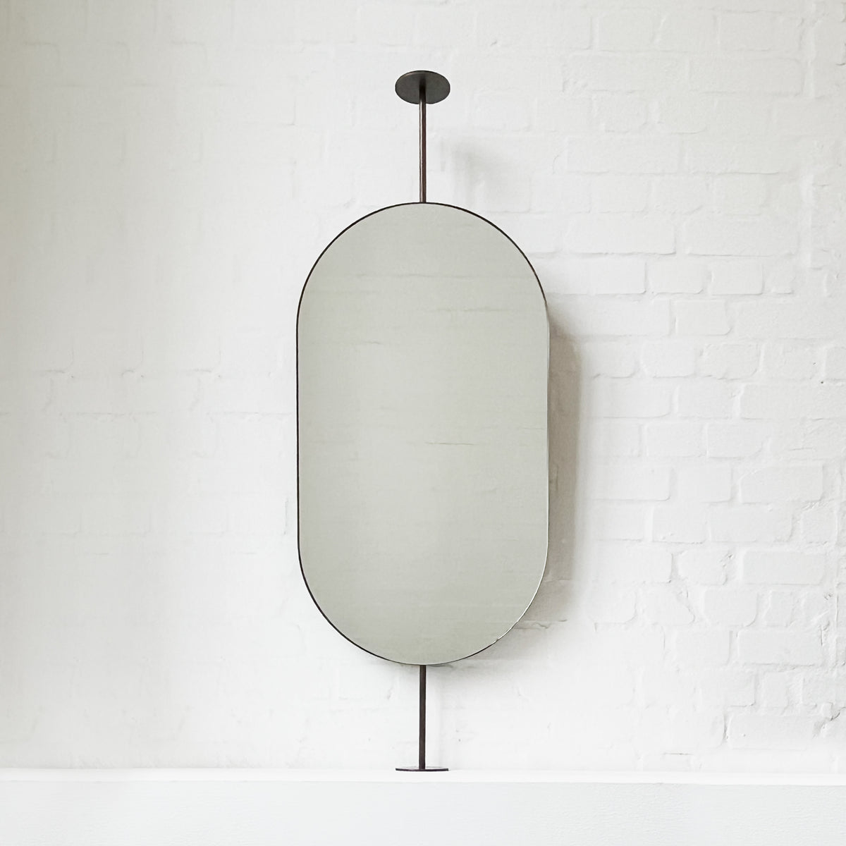 Countertop-to-Ceiling Capsula™ Mirror with Bronze Patina Brass Frame