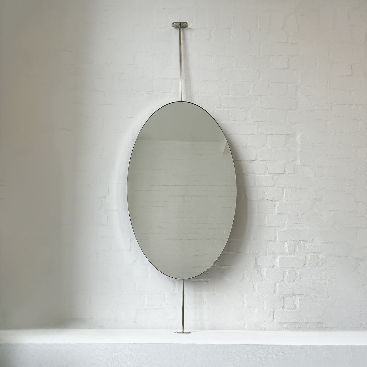 Ovalis™ Floor to Ceiling Attached Mirror with a Nickel Plated Frame