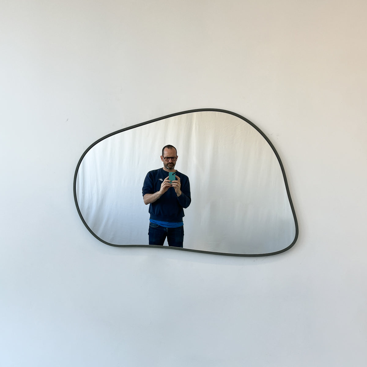 Freeform Irregular Mirror with Grey Suede Fabric Frame