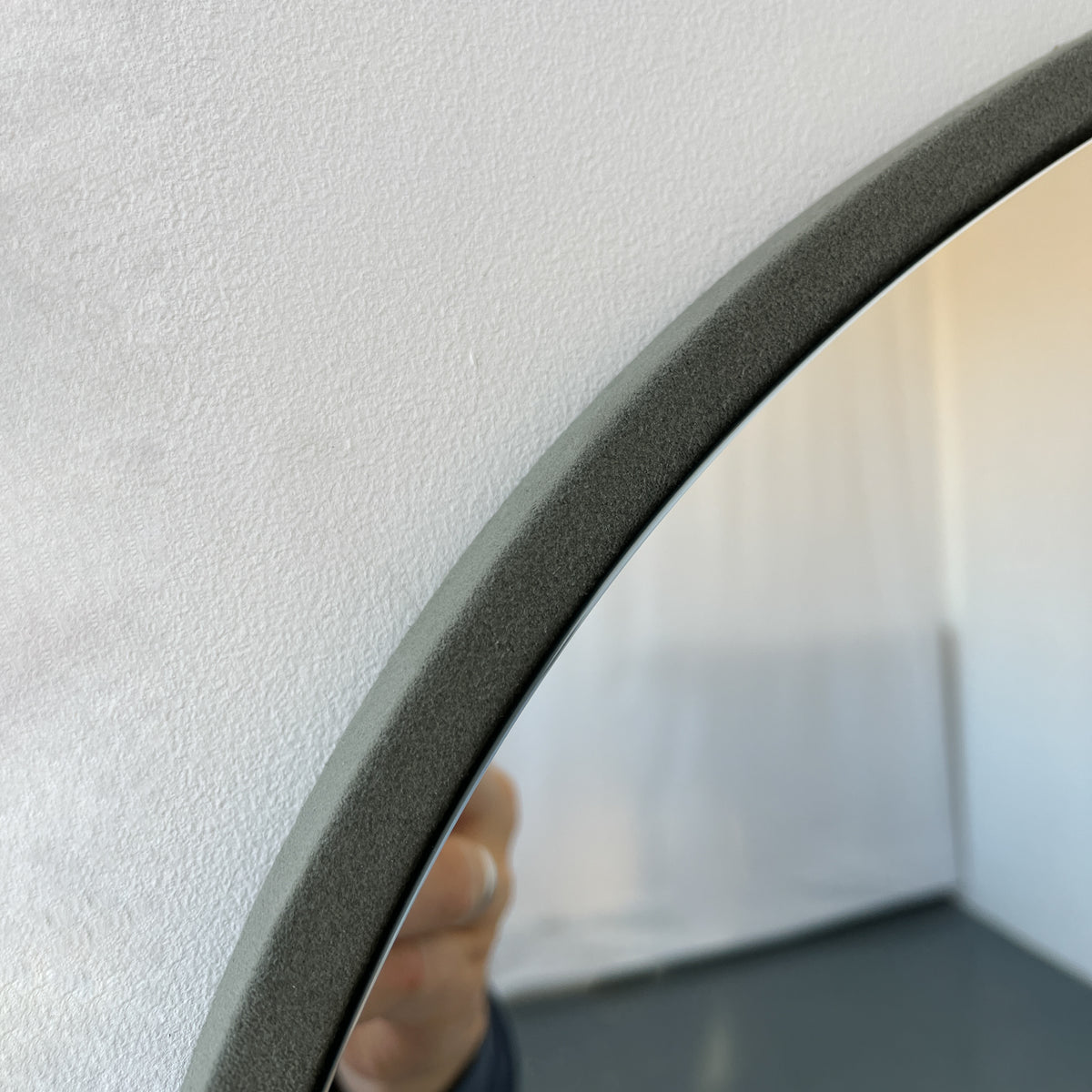 Freeform Irregular Mirror with Grey Suede Fabric Frame