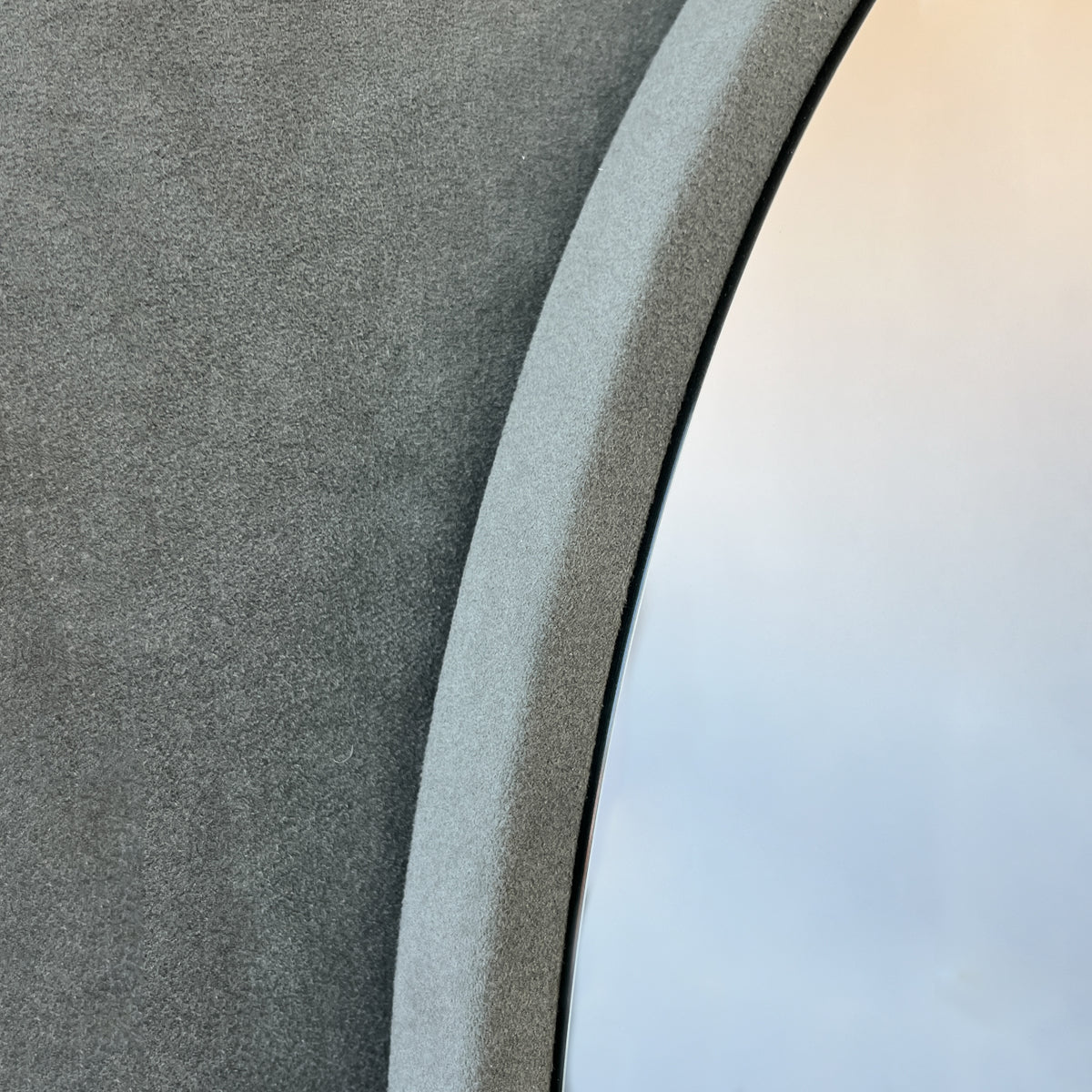 Freeform Irregular Mirror with Grey Suede Fabric Frame