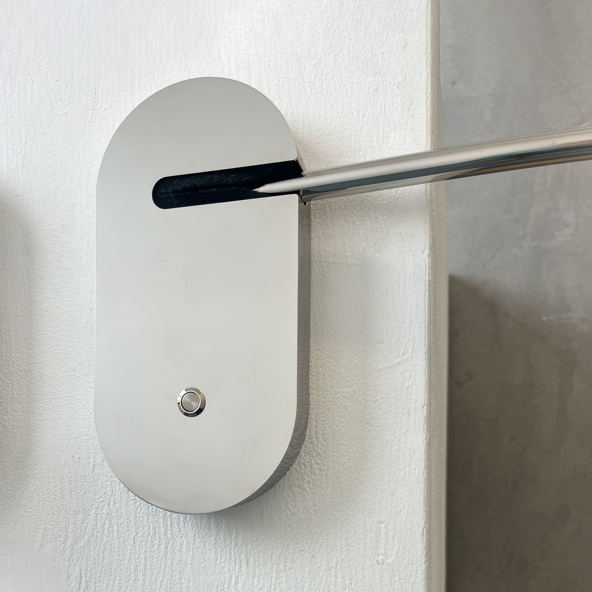 Illuminated Wall-Attached Magnifying Mirror with Brass Frame and Collapsible Arm
