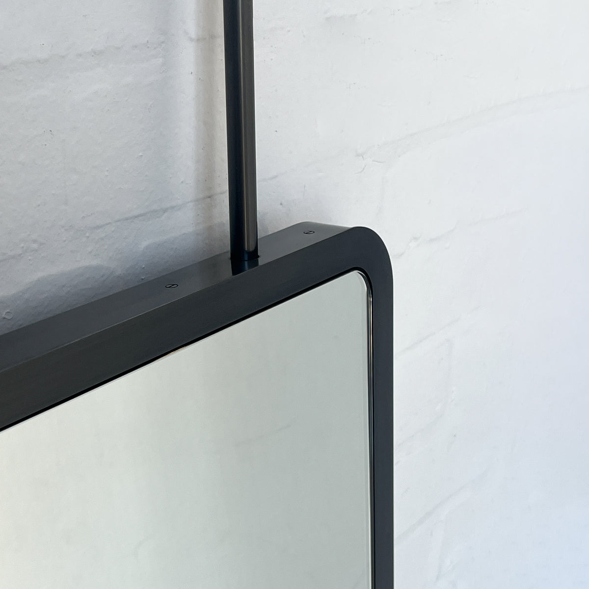 Countertop to Ceiling Quadris™ Mirror with Blackened Stainless Steel Frame