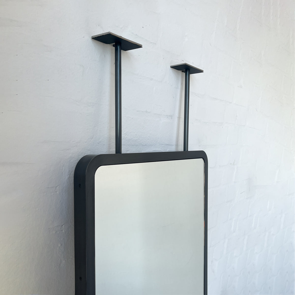Countertop to Ceiling Quadris™ Mirror with Blackened Stainless Steel Frame