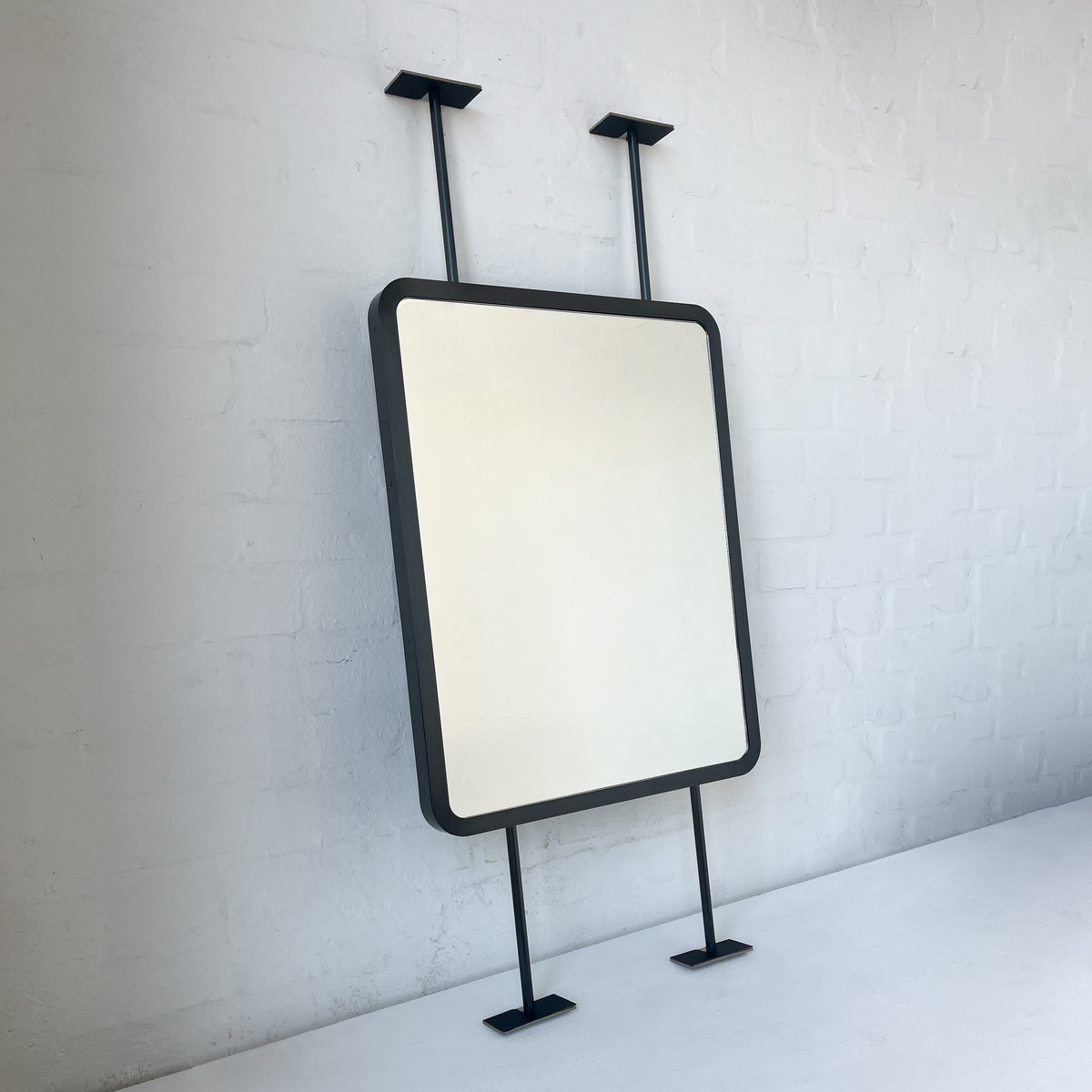 Countertop to Ceiling Quadris™ Mirror with Blackened Stainless Steel Frame
