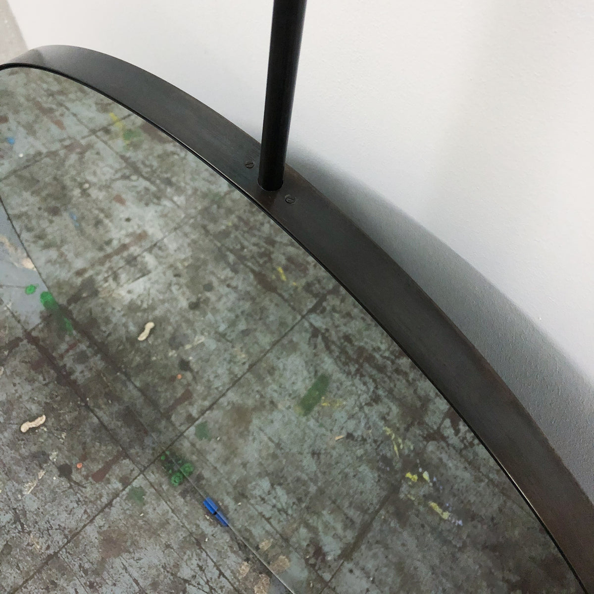 Orbis™ Suspended Round Mirror with Contemporary Blackened Stainless Steel Frame