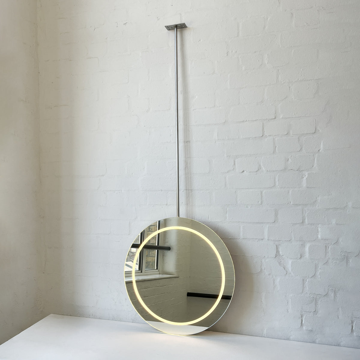 Orbis™ Ceiling Suspended Illuminated Round Frameless Mirror