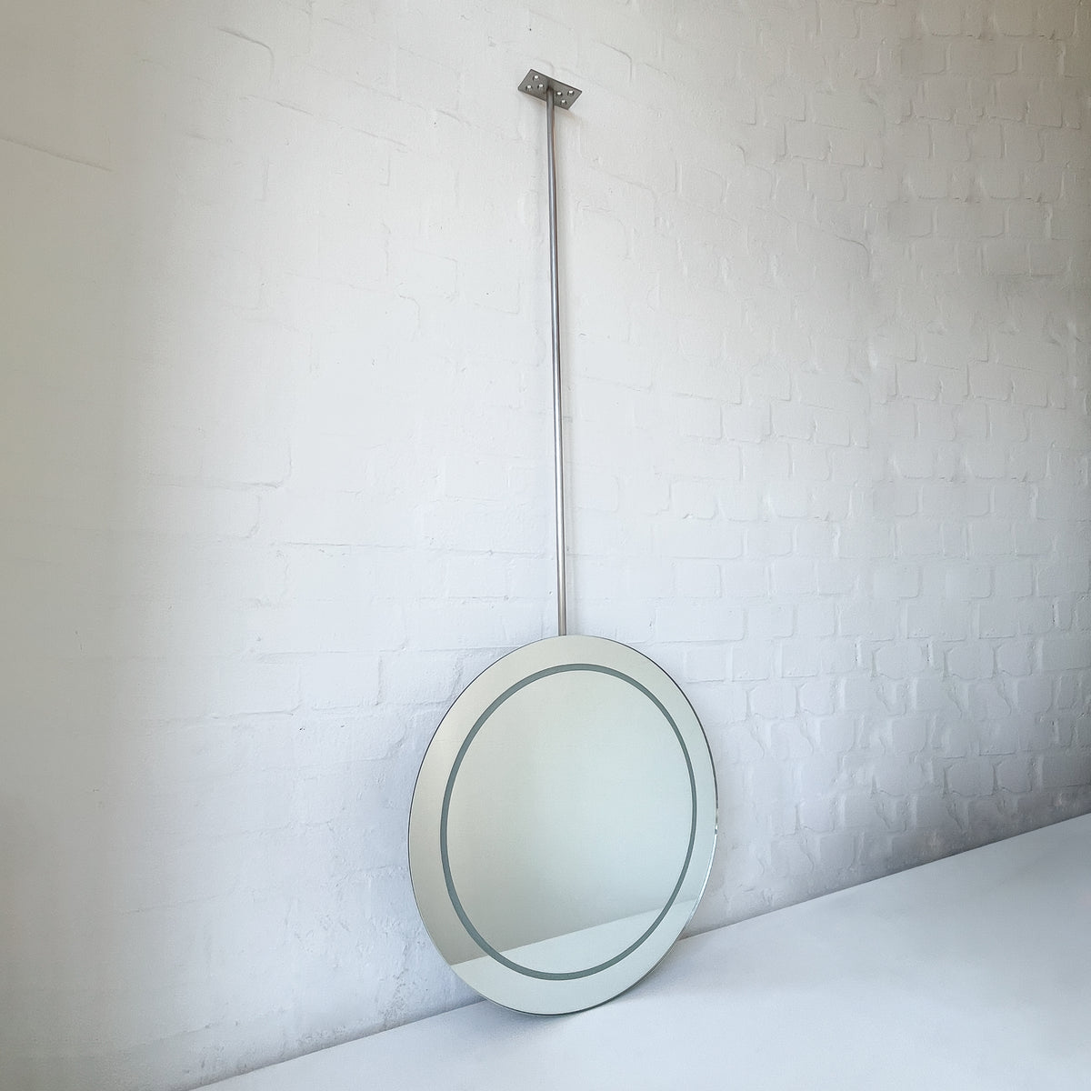 NEW Orbis™ Ceiling-Suspended Illuminated Round Frameless Mirror