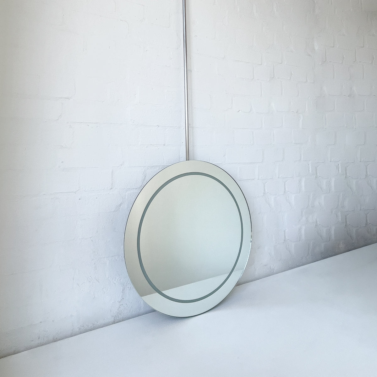 NEW Orbis™ Ceiling-Suspended Illuminated Round Frameless Mirror