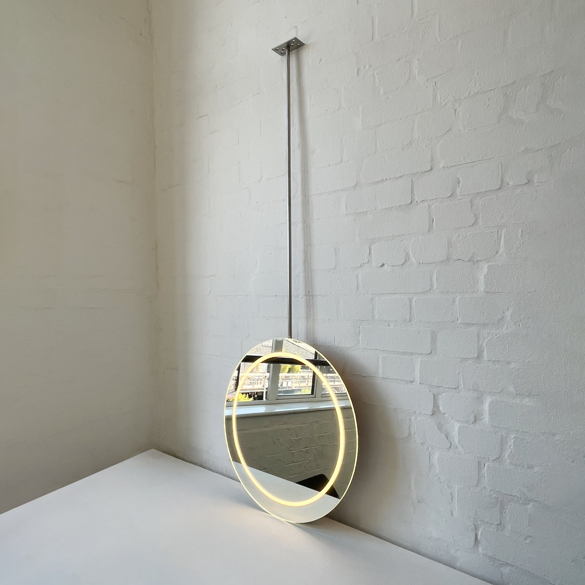 Orbis™ Ceiling Suspended Illuminated Round Frameless Mirror