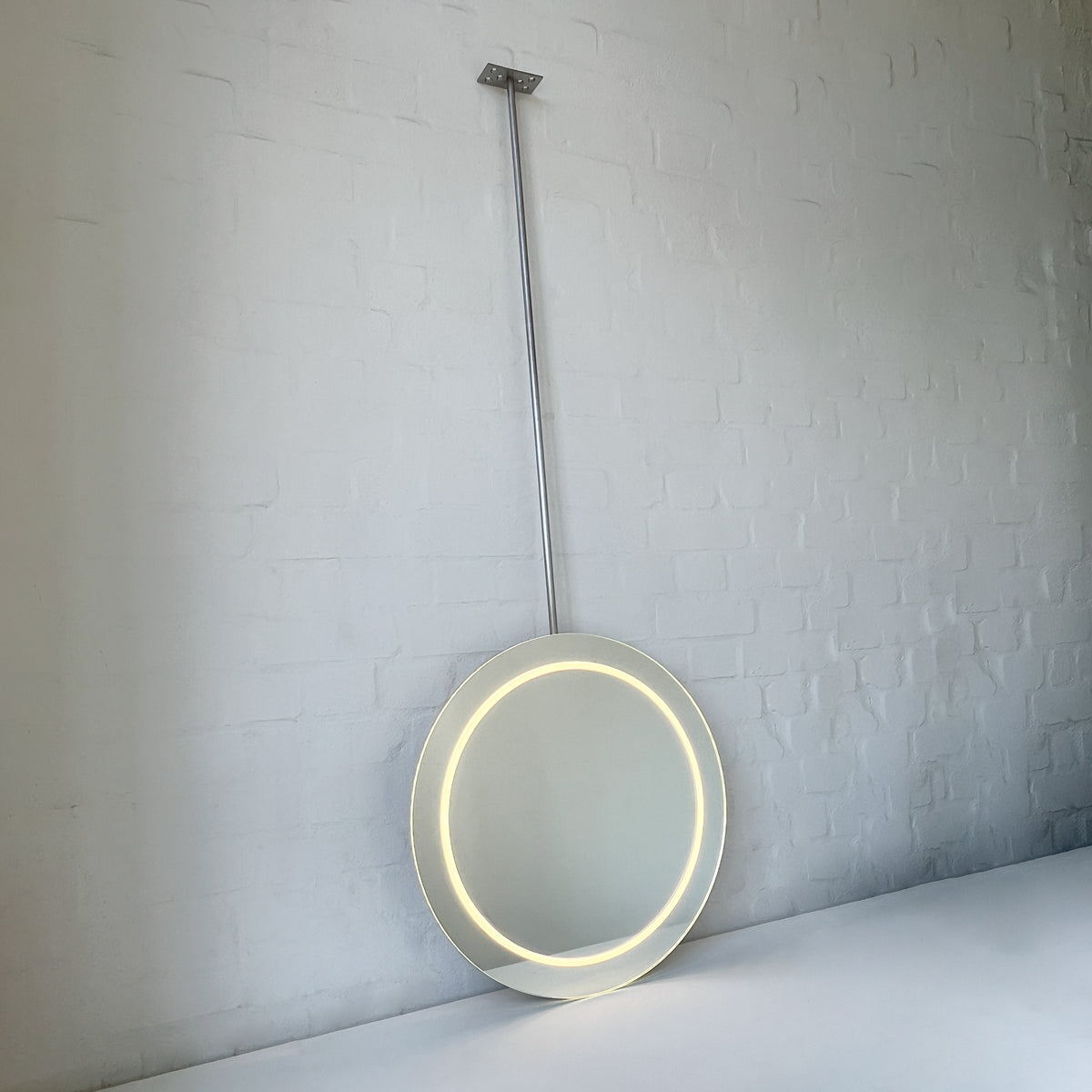 Orbis™ Ceiling Suspended Illuminated Round Frameless Mirror