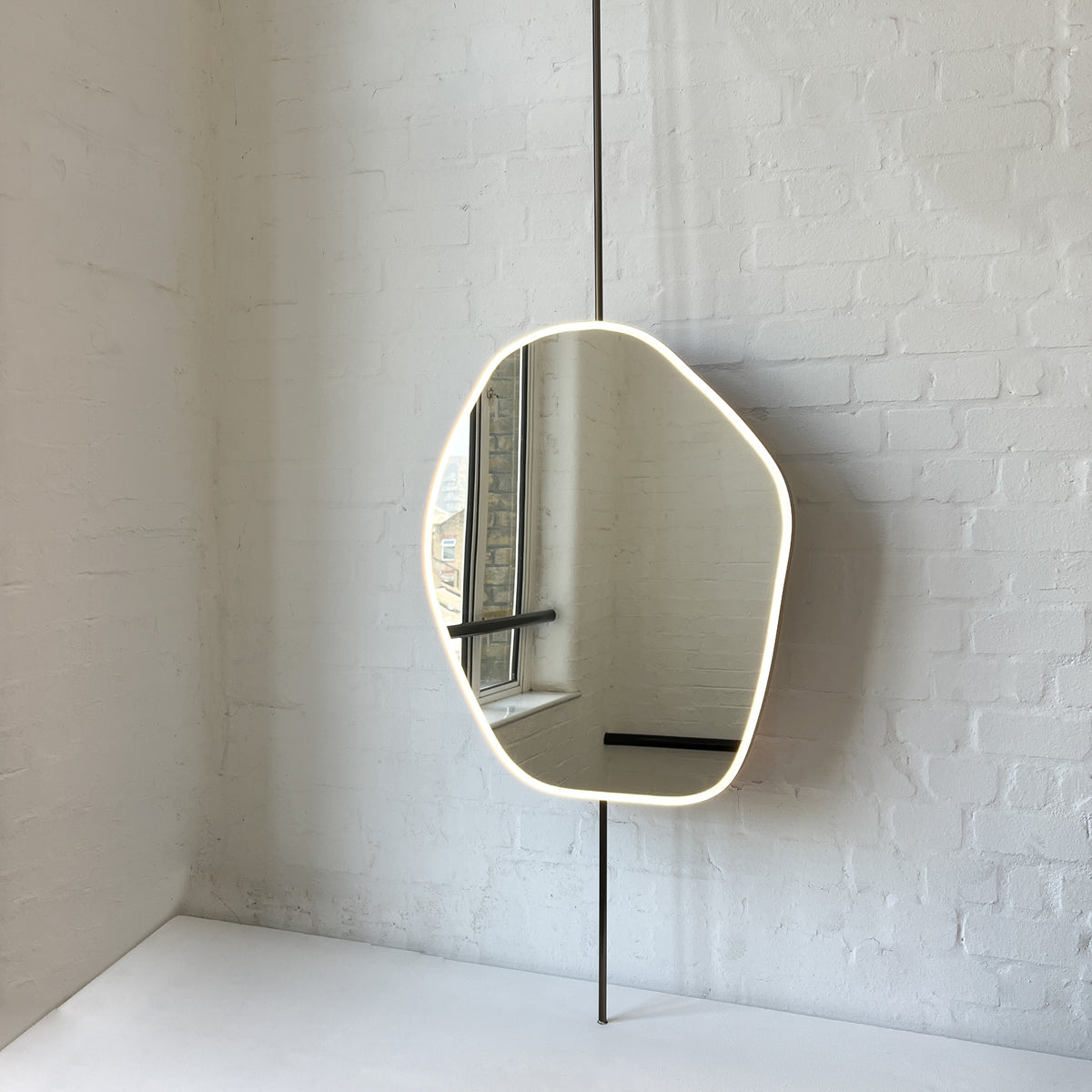 Countertop-to-Ceiling Roca Freeform Illuminated Mirror with Bronze Patina Brass Frame