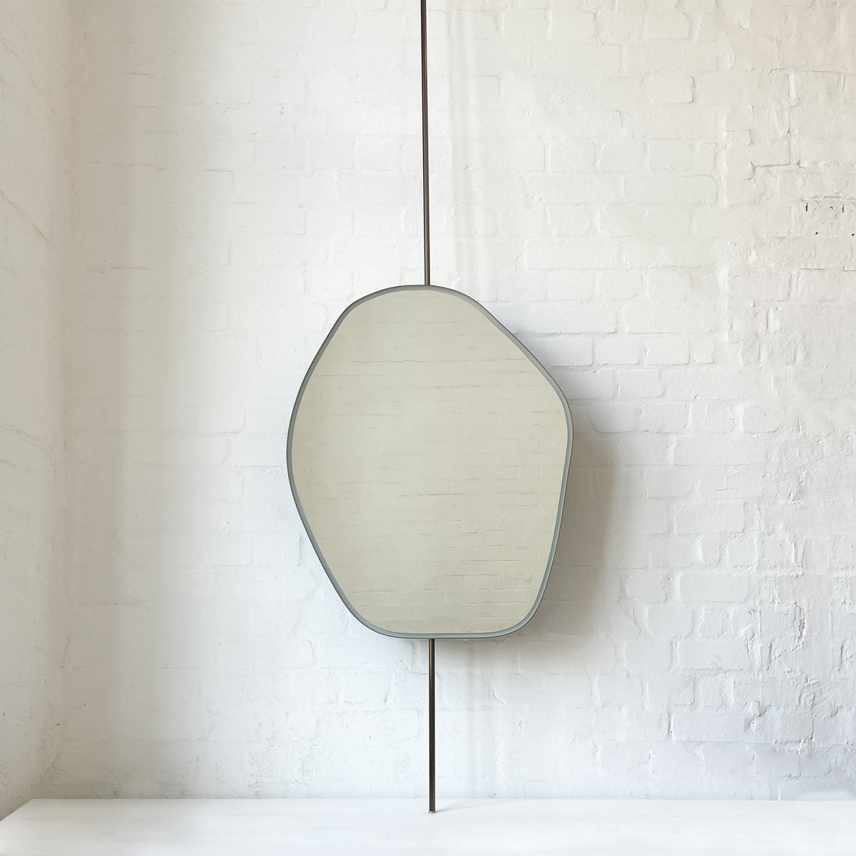 Countertop to Ceiling Freeform Illuminated Mirror with Bronze Patina Brass Frame
