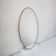 Ovalis™ Oval shaped Front Illuminated Modern Large Mirror with a Brushed Brass Frame